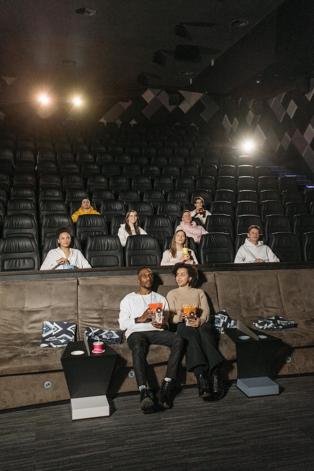 Group of people watching a movie together
